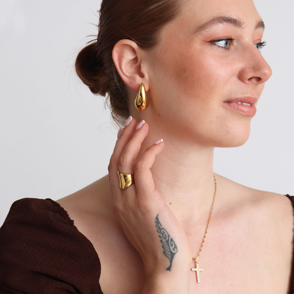 Orecchini pendenti a forma di pera - Oro