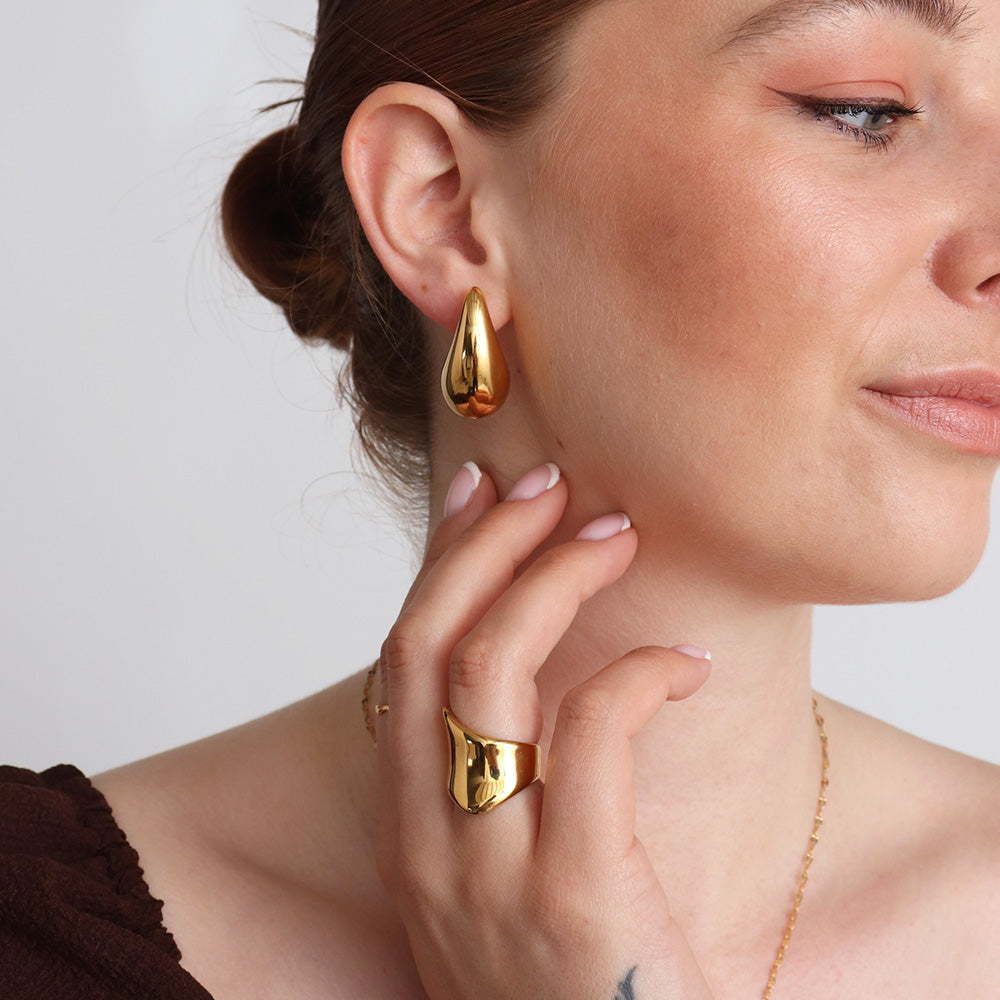 Orecchini pendenti a forma di pera - Oro