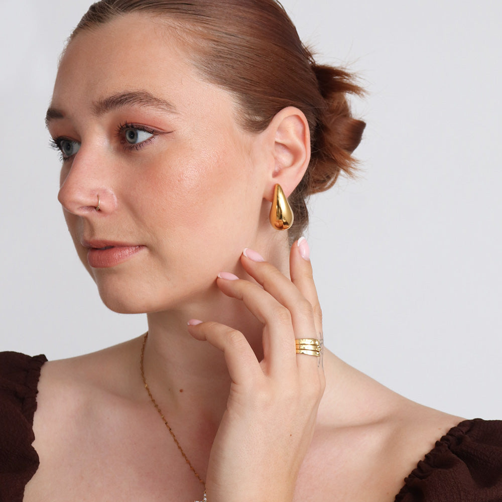 Orecchini pendenti a forma di pera - Oro