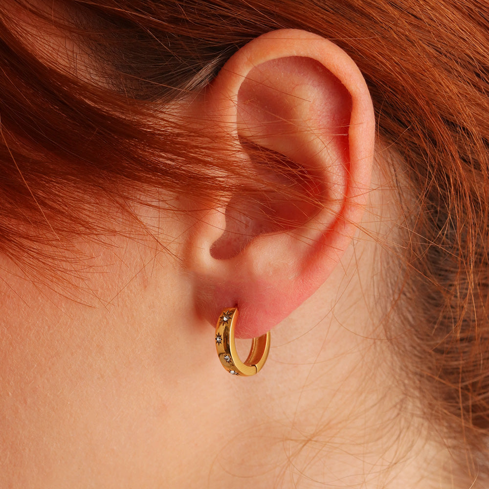 Creolen mit gefassten Sternen – Gold